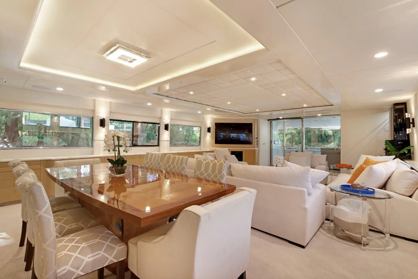 a living room with a table and chairs aboard MARY KATHLENE Yacht for Sale