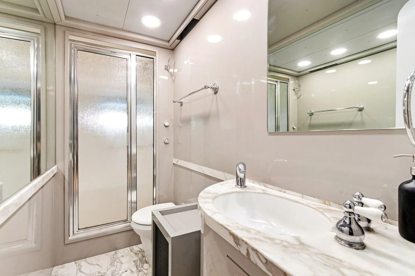 a bathroom with a sink and a mirror aboard MARY KATHLENE Yacht for Sale