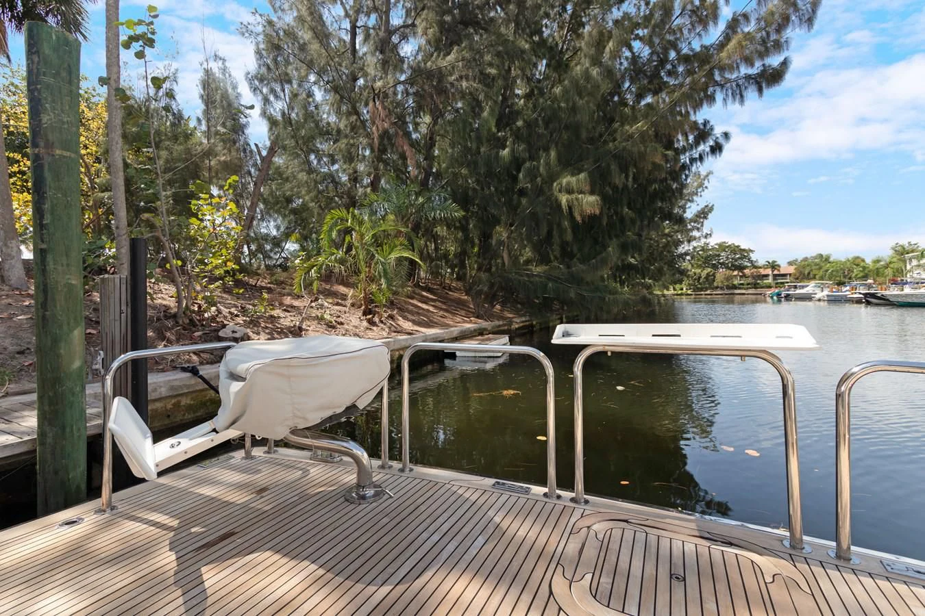 a deck with a chair and a pool on it aboard MARY KATHLENE Yacht for Sale