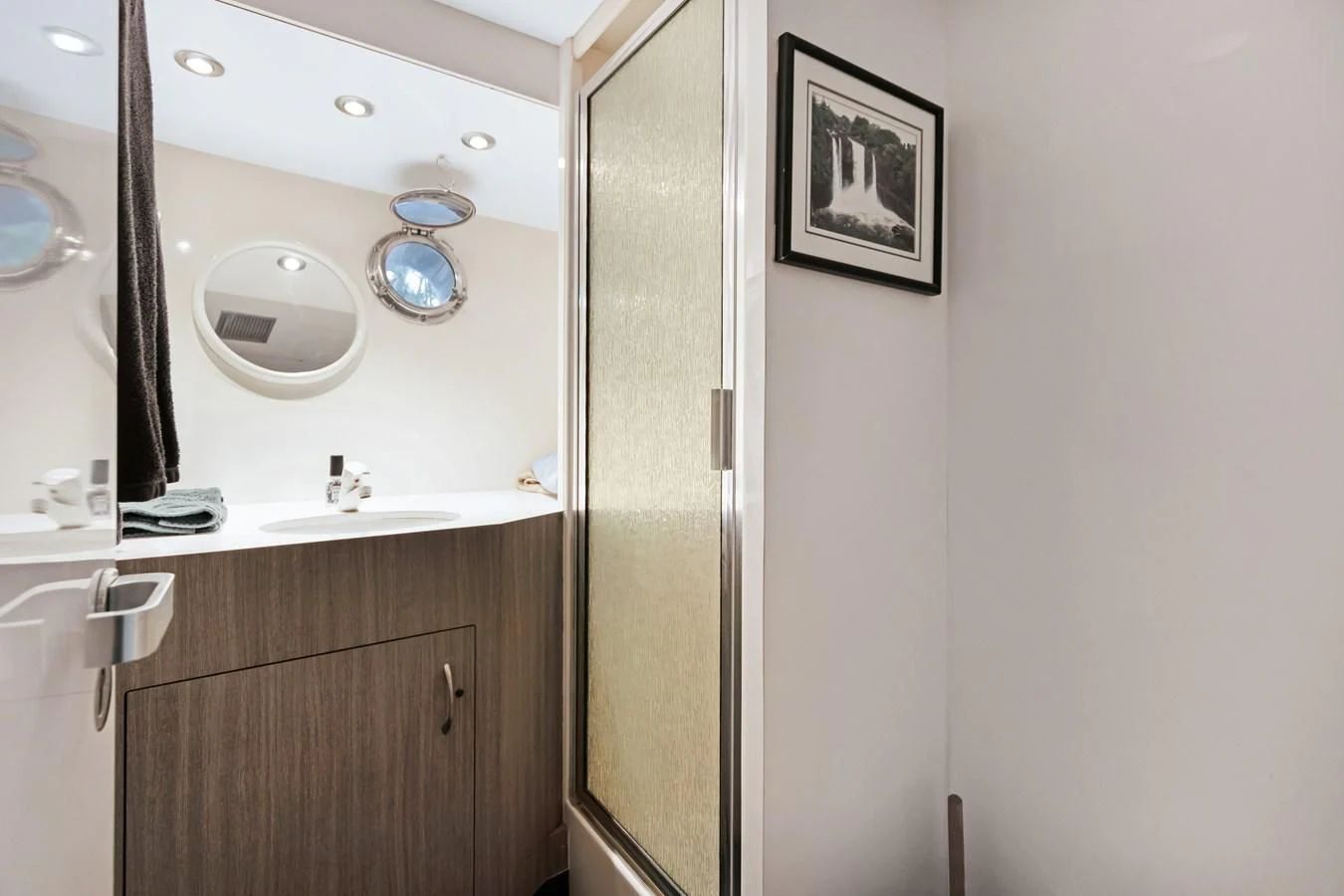 a bathroom with a mirror and a sink aboard MARY KATHLENE Yacht for Sale