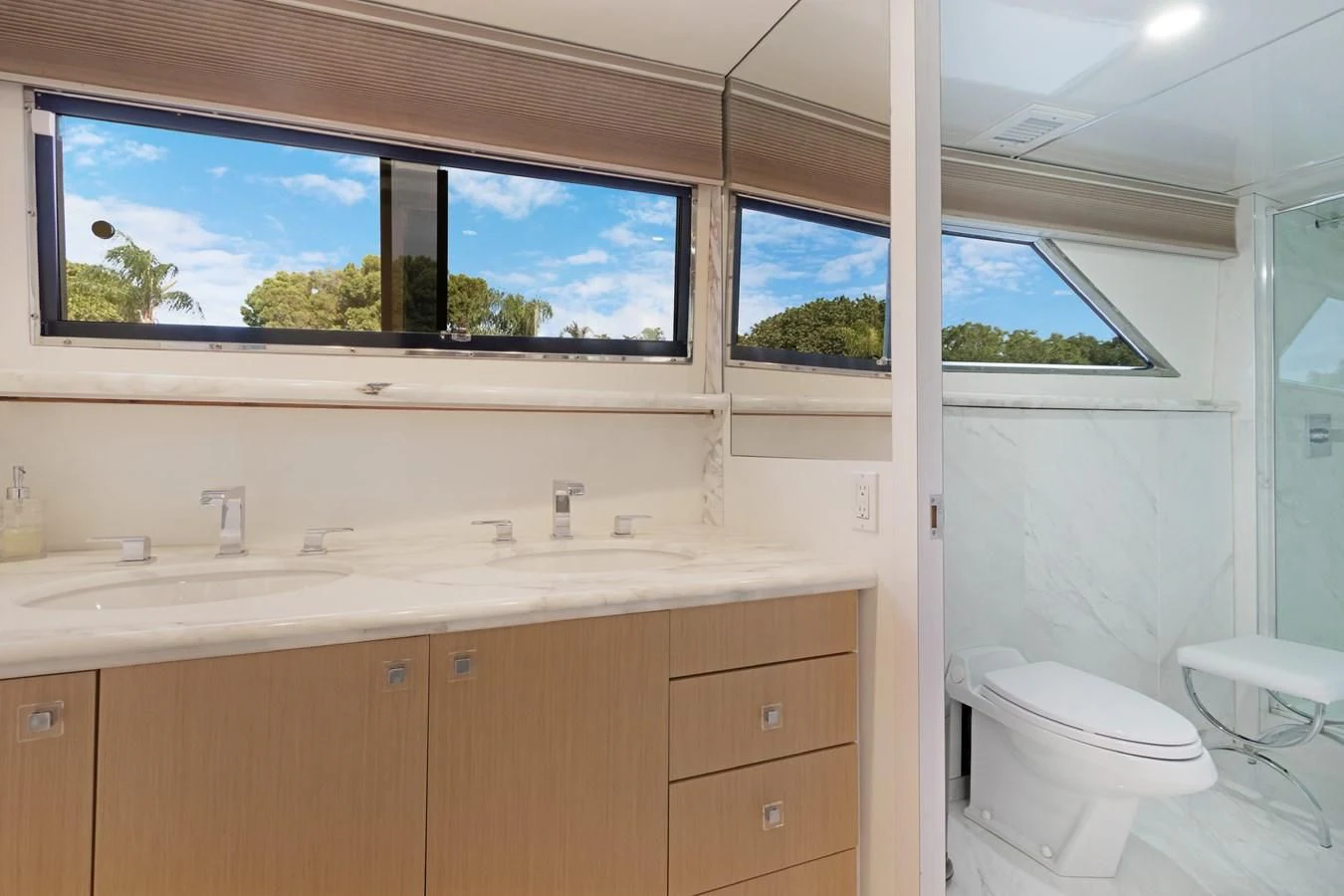 a bathroom with a large window aboard MARY KATHLENE Yacht for Sale
