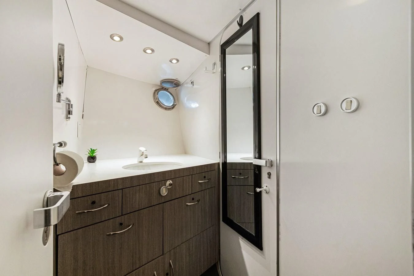a bathroom with a sink and a mirror aboard MARY KATHLENE Yacht for Sale