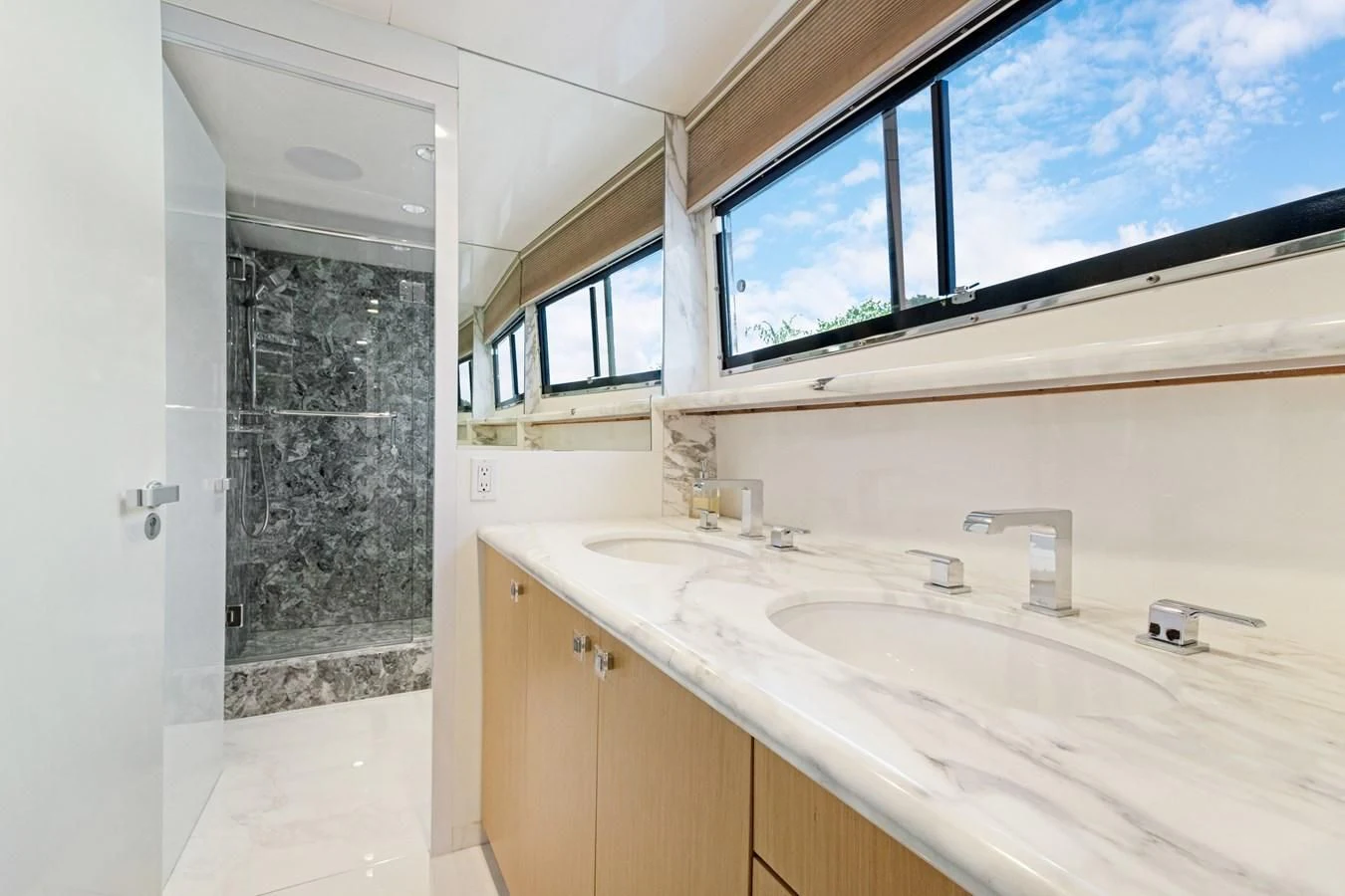 a bathroom with a sink and a shower aboard MARY KATHLENE Yacht for Sale
