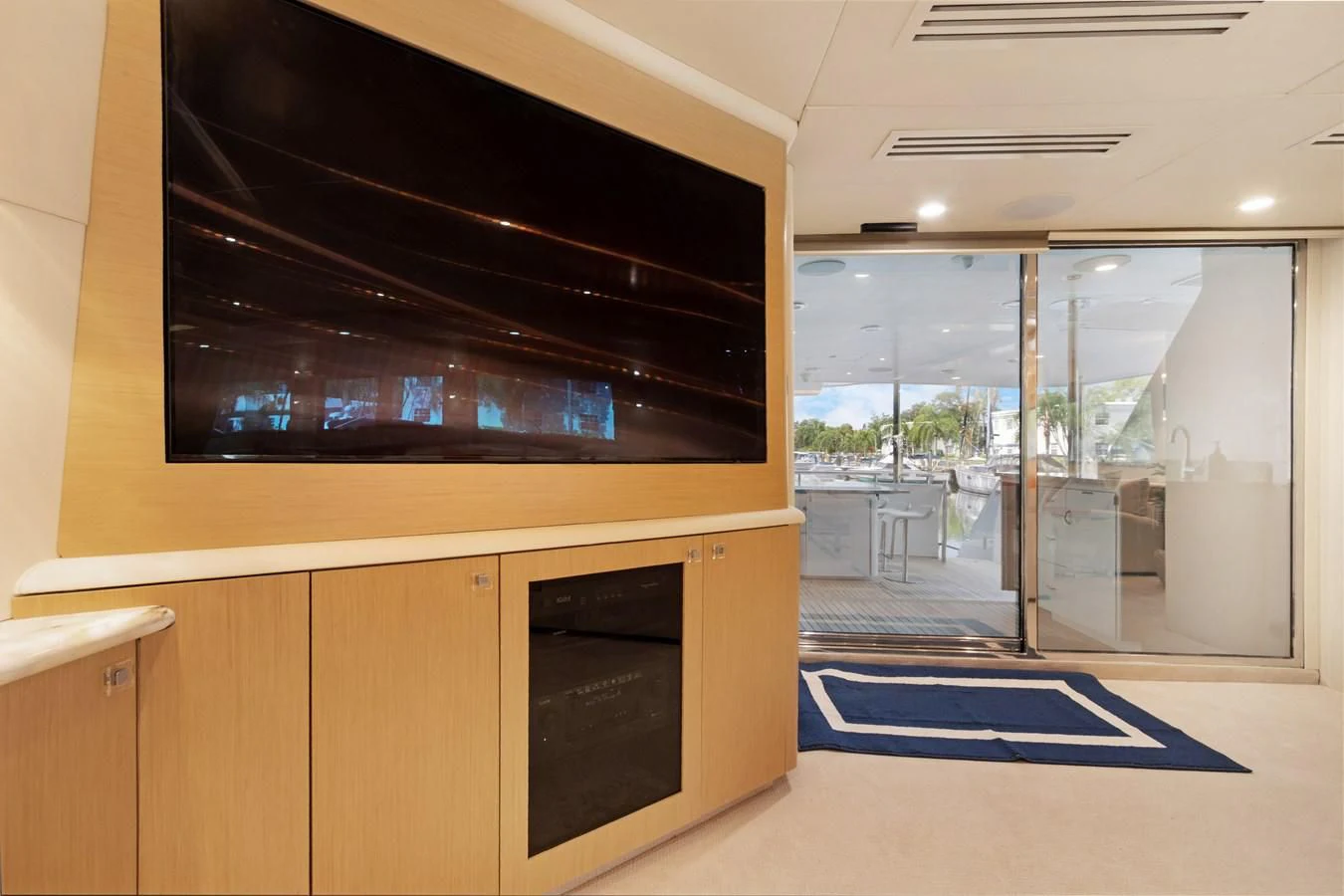 a room with a large window and a large black oven aboard MARY KATHLENE Yacht for Sale