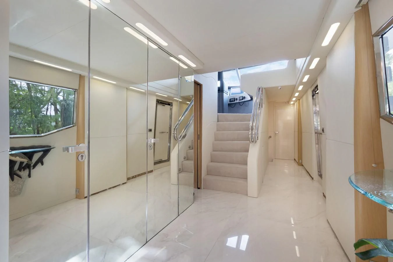 a hallway with a glass door aboard MARY KATHLENE Yacht for Sale