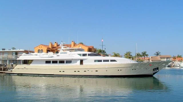 a large white boat in a harbor aboard MARY KATHLENE Yacht for Sale