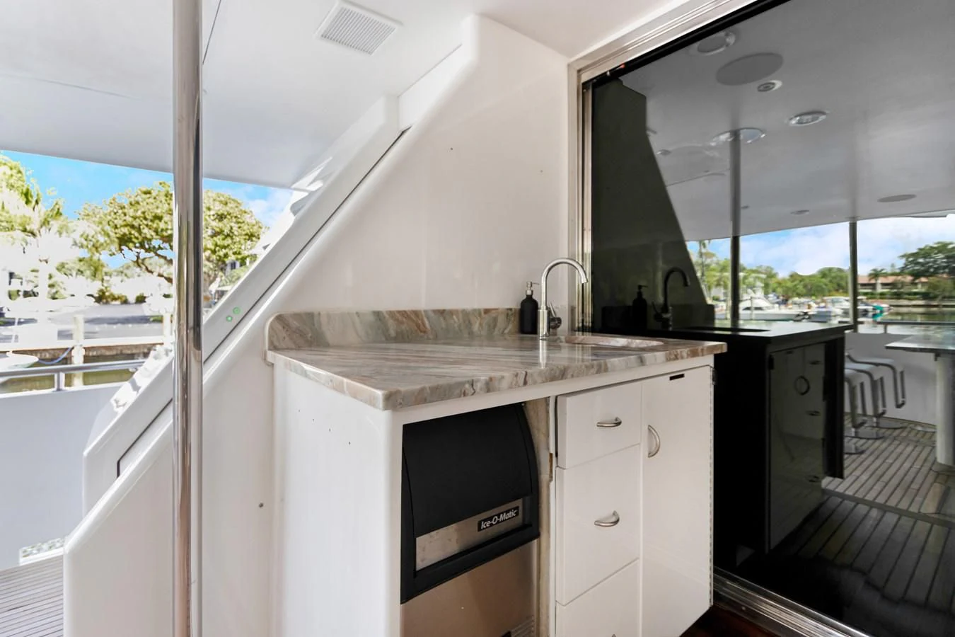 a kitchen with a sink and a window aboard MARY KATHLENE Yacht for Sale