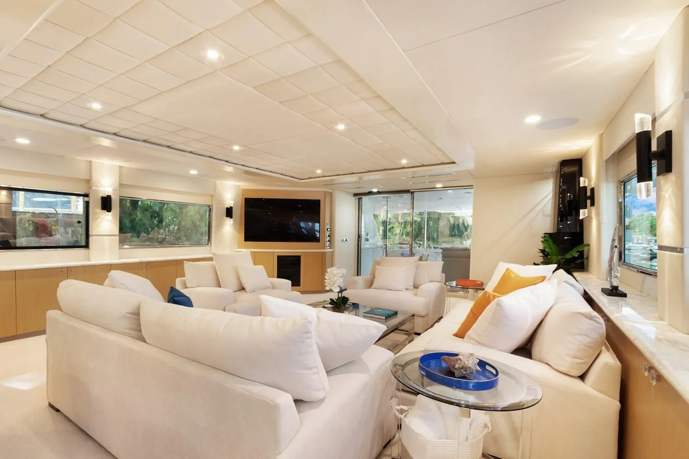 a living room with white couches aboard MARY KATHLENE Yacht for Sale