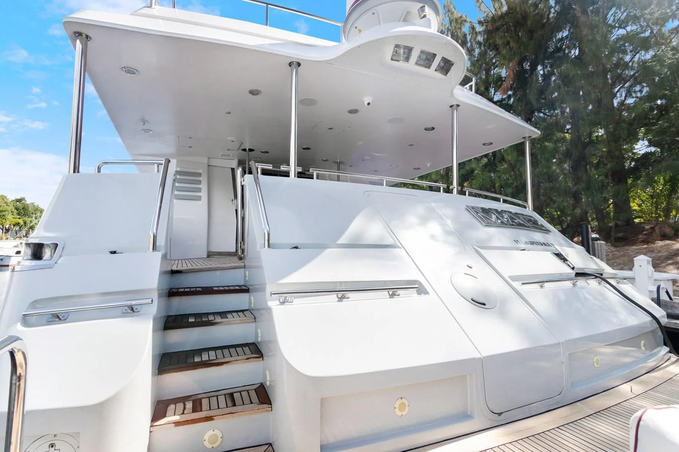 a white boat with a staircase aboard MARY KATHLENE Yacht for Sale
