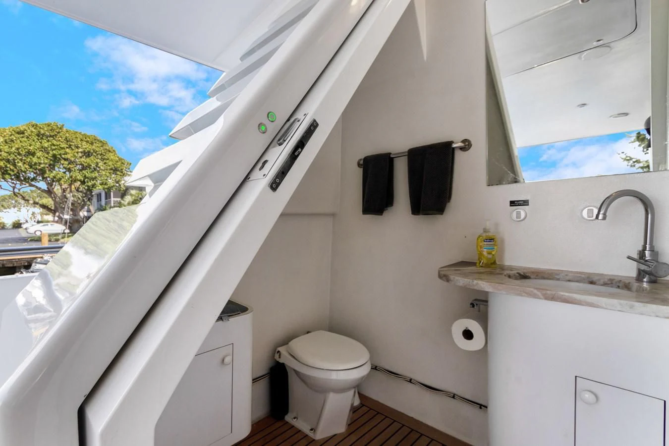 a bathroom with a toilet and sink aboard MARY KATHLENE Yacht for Sale