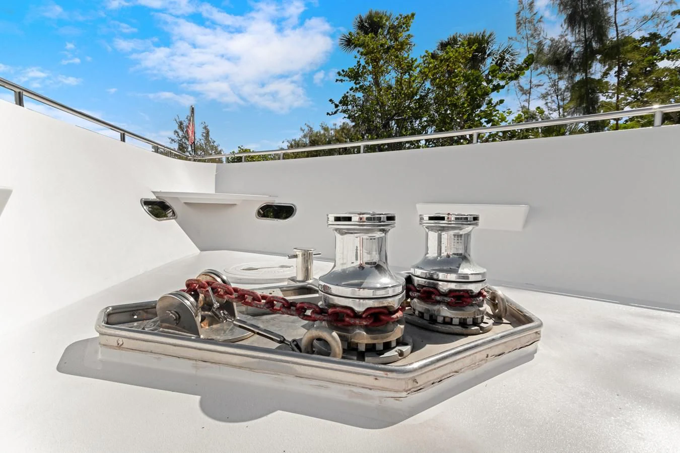 a white car with a red and black engine on a white surface aboard MARY KATHLENE Yacht for Sale