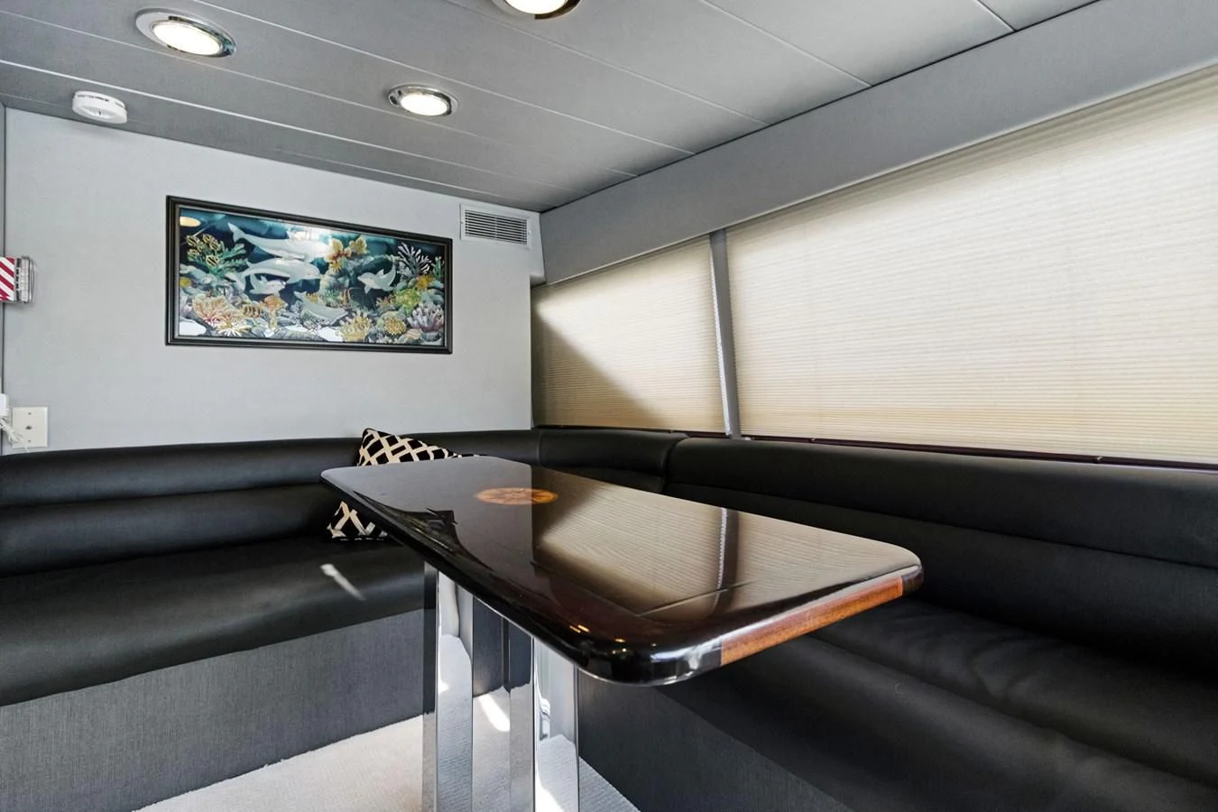 a room with a table and chairs aboard MARY KATHLENE Yacht for Sale