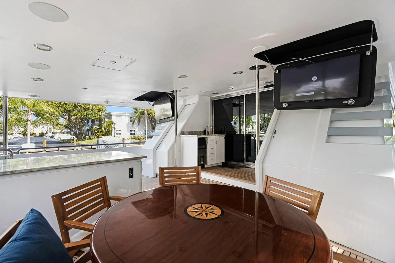 a kitchen with a table and chairs aboard MARY KATHLENE Yacht for Sale