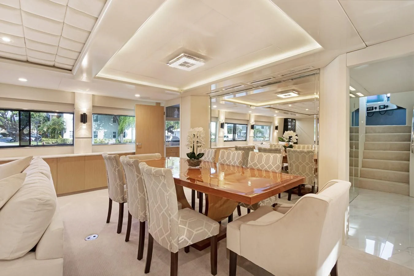 a large dining table in a room aboard MARY KATHLENE Yacht for Sale