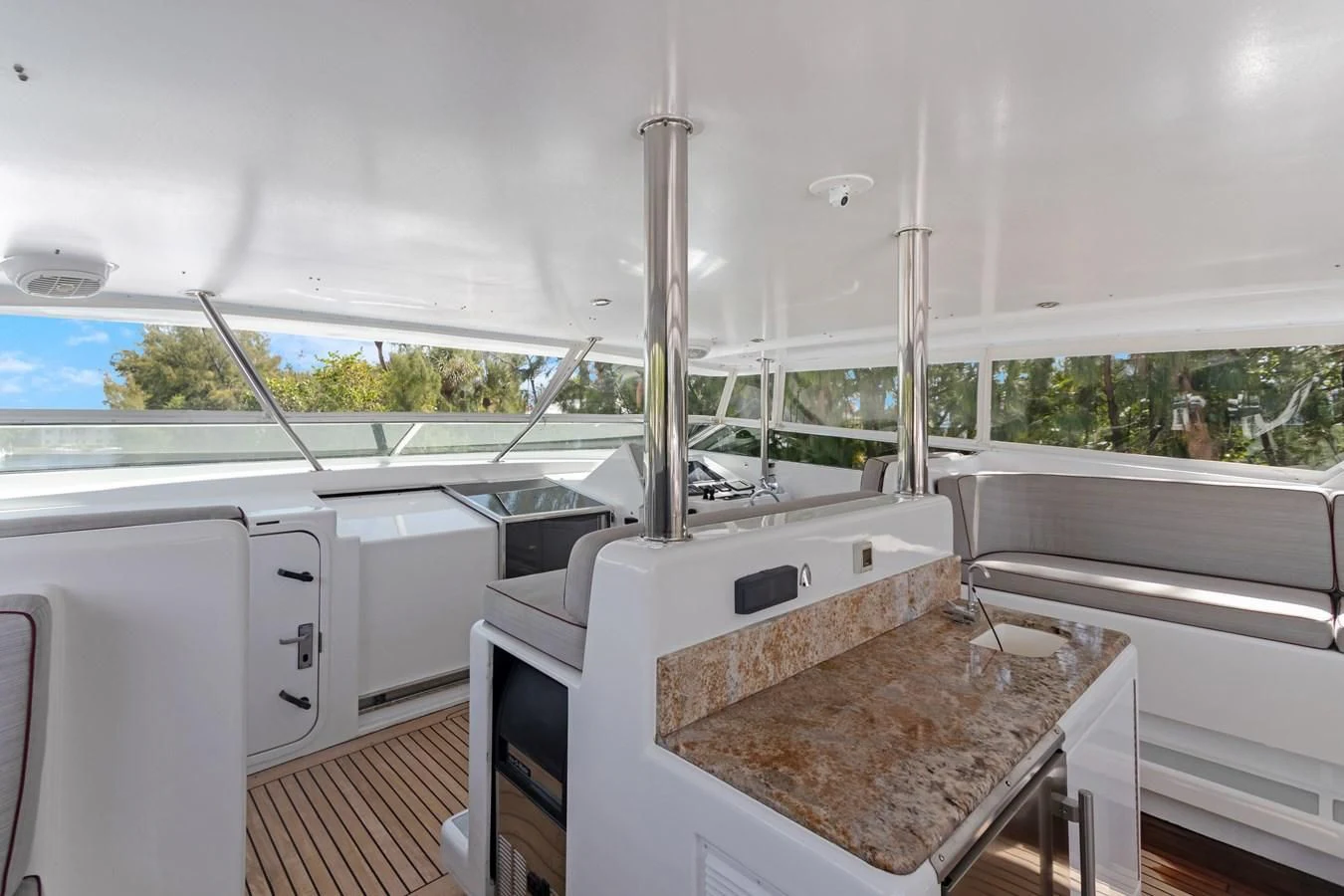 a large white kitchen with a large window aboard MARY KATHLENE Yacht for Sale