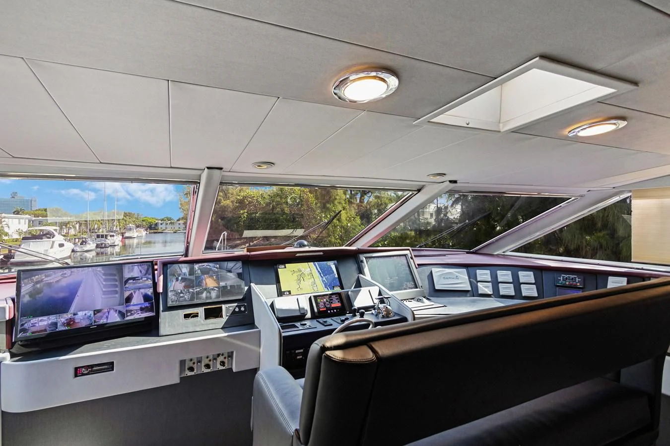 inside of a car with many screens aboard MARY KATHLENE Yacht for Sale