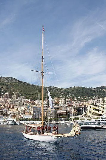 a sailboat with people on it aboard TUIGA Yacht for Sale