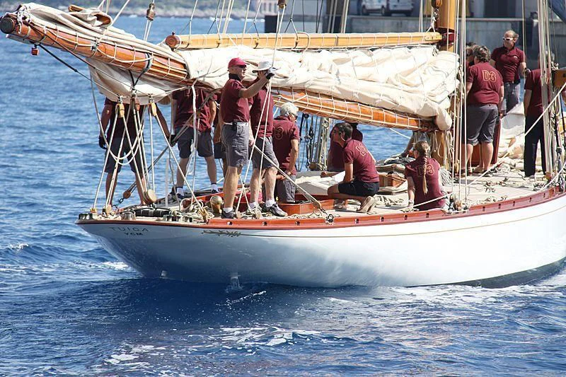 a group of people on a boat aboard TUIGA Yacht for Sale