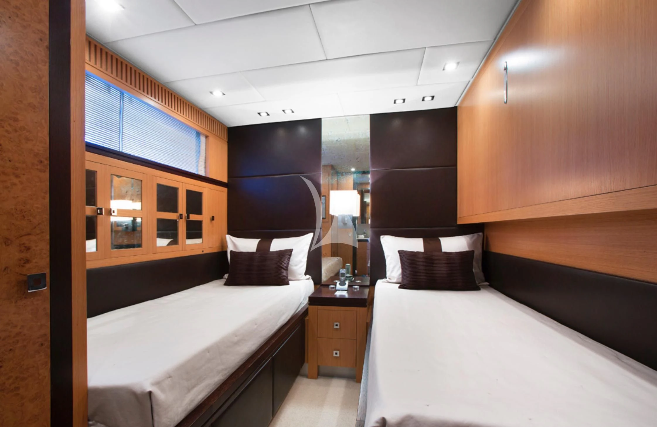 a room with two beds aboard EOL B Yacht for Sale