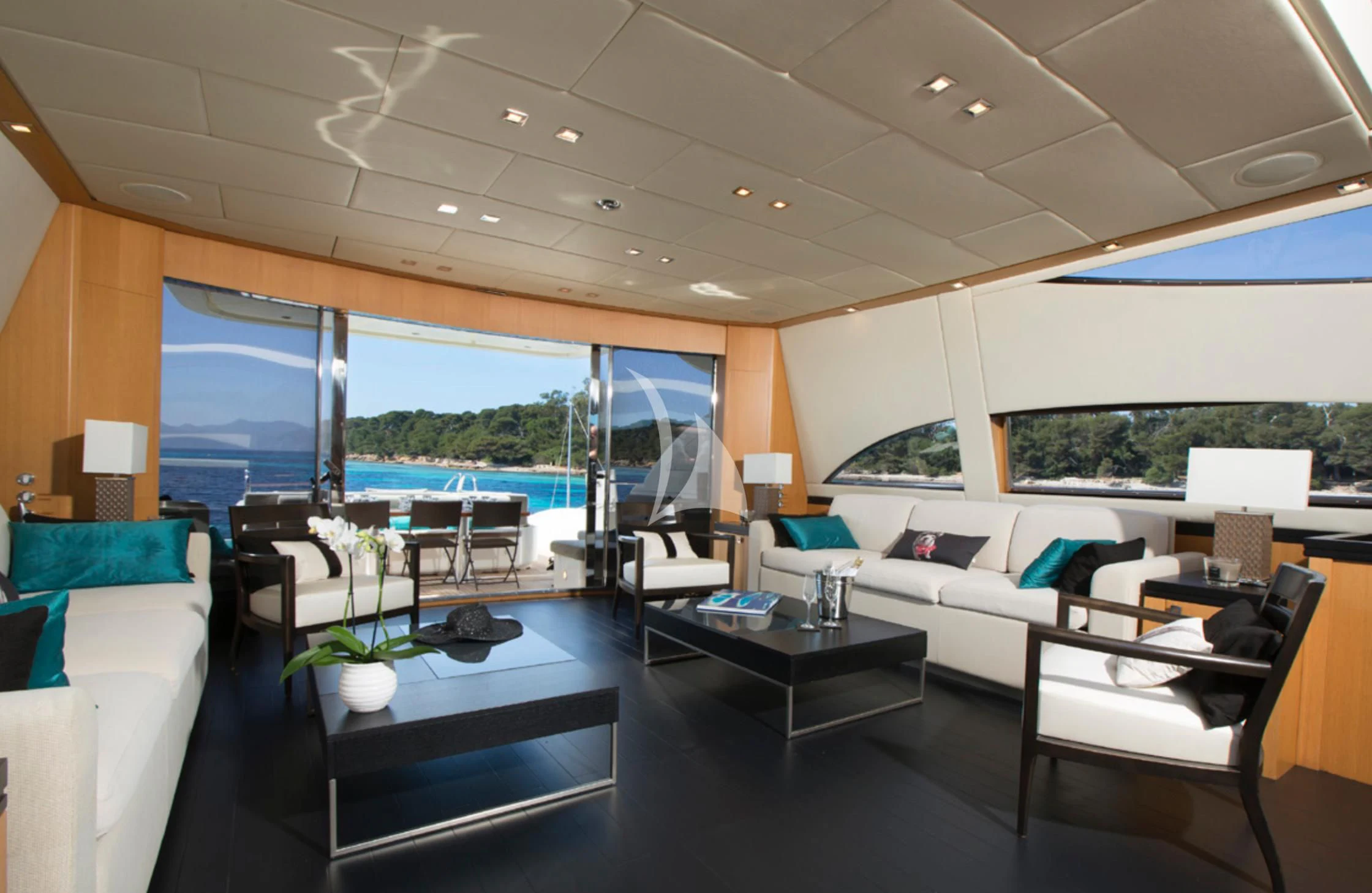 a room with a table and chairs aboard EOL B Yacht for Sale
