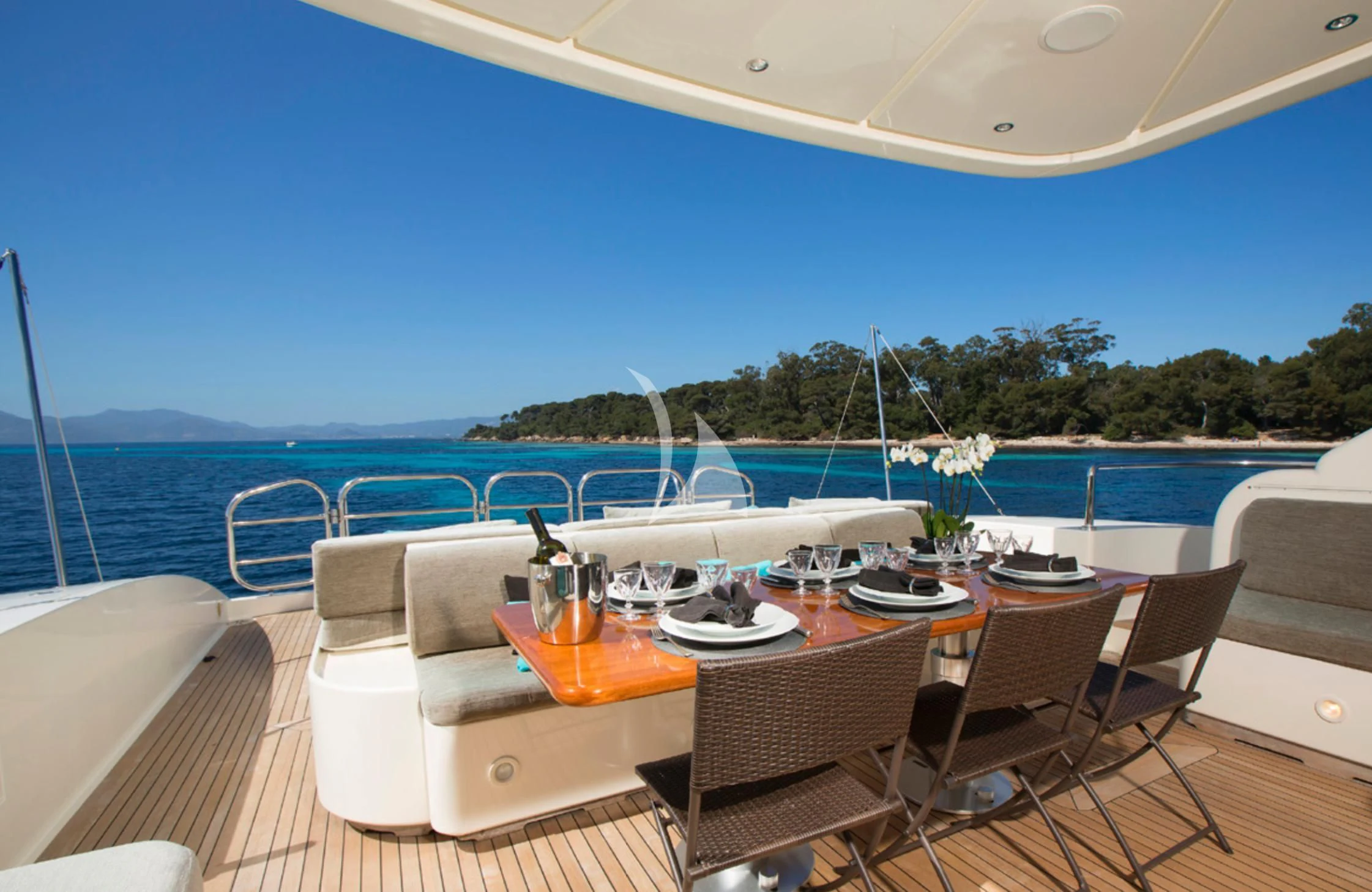 a table set for a meal on a boat aboard EOL B Yacht for Sale
