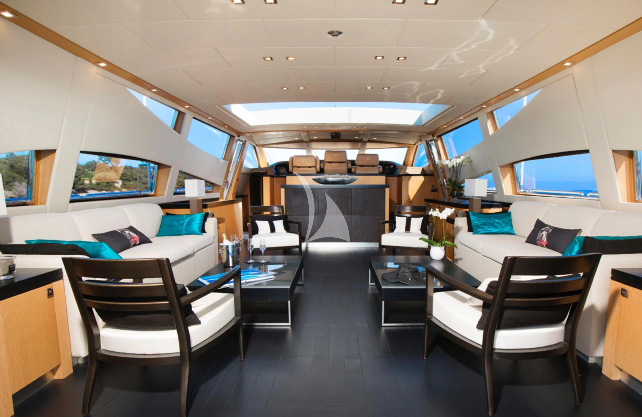 a room with a couch and chairs aboard EOL B Yacht for Sale