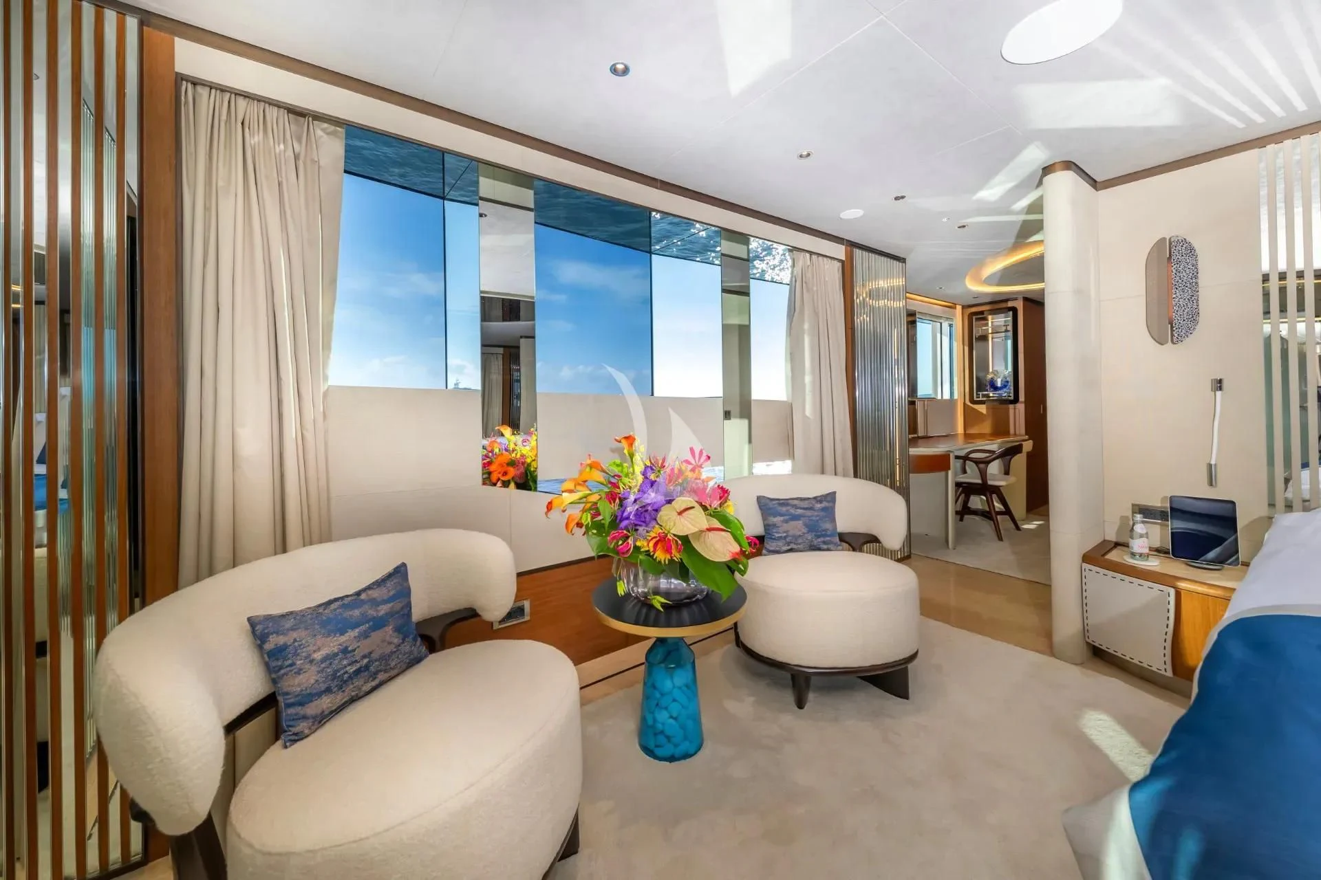 a living room with a large window aboard ETERNAL SPARK Yacht for Sale