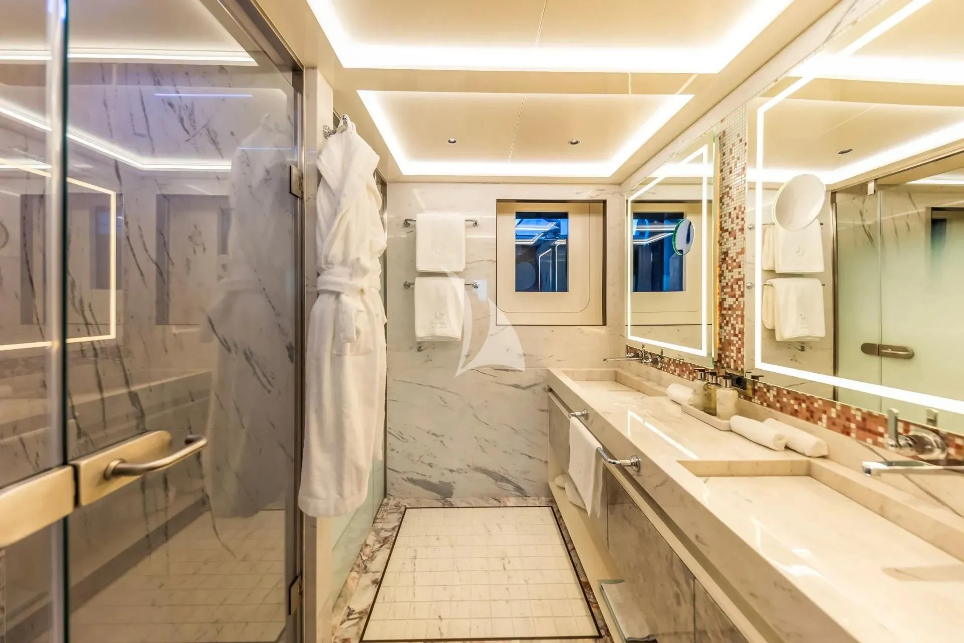 a bathroom with a large mirror aboard ETERNAL SPARK Yacht for Sale