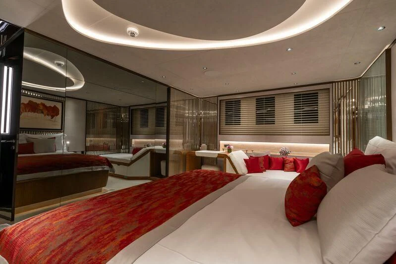 a room with a bed and a couch aboard ETERNAL SPARK Yacht for Sale