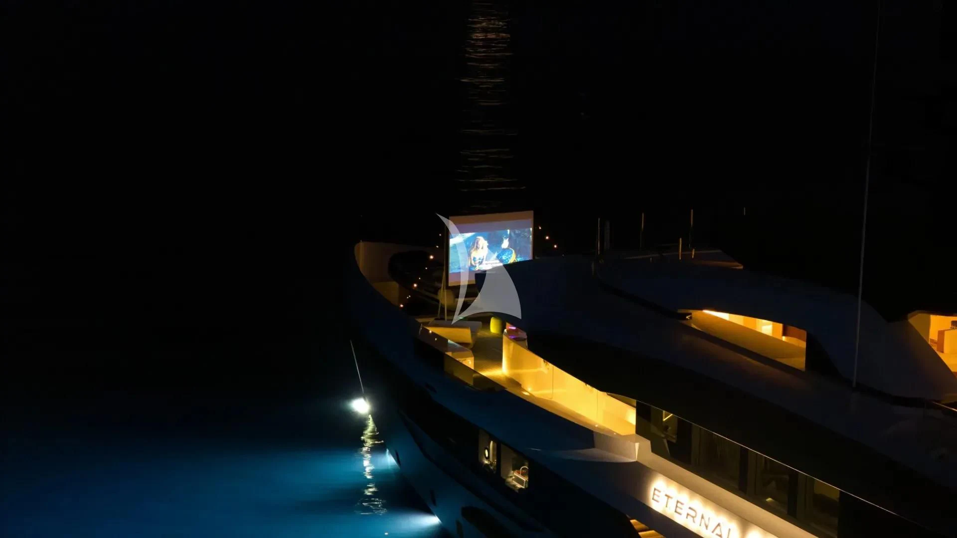 a space ship with a satellite in the background aboard ETERNAL SPARK Yacht for Sale