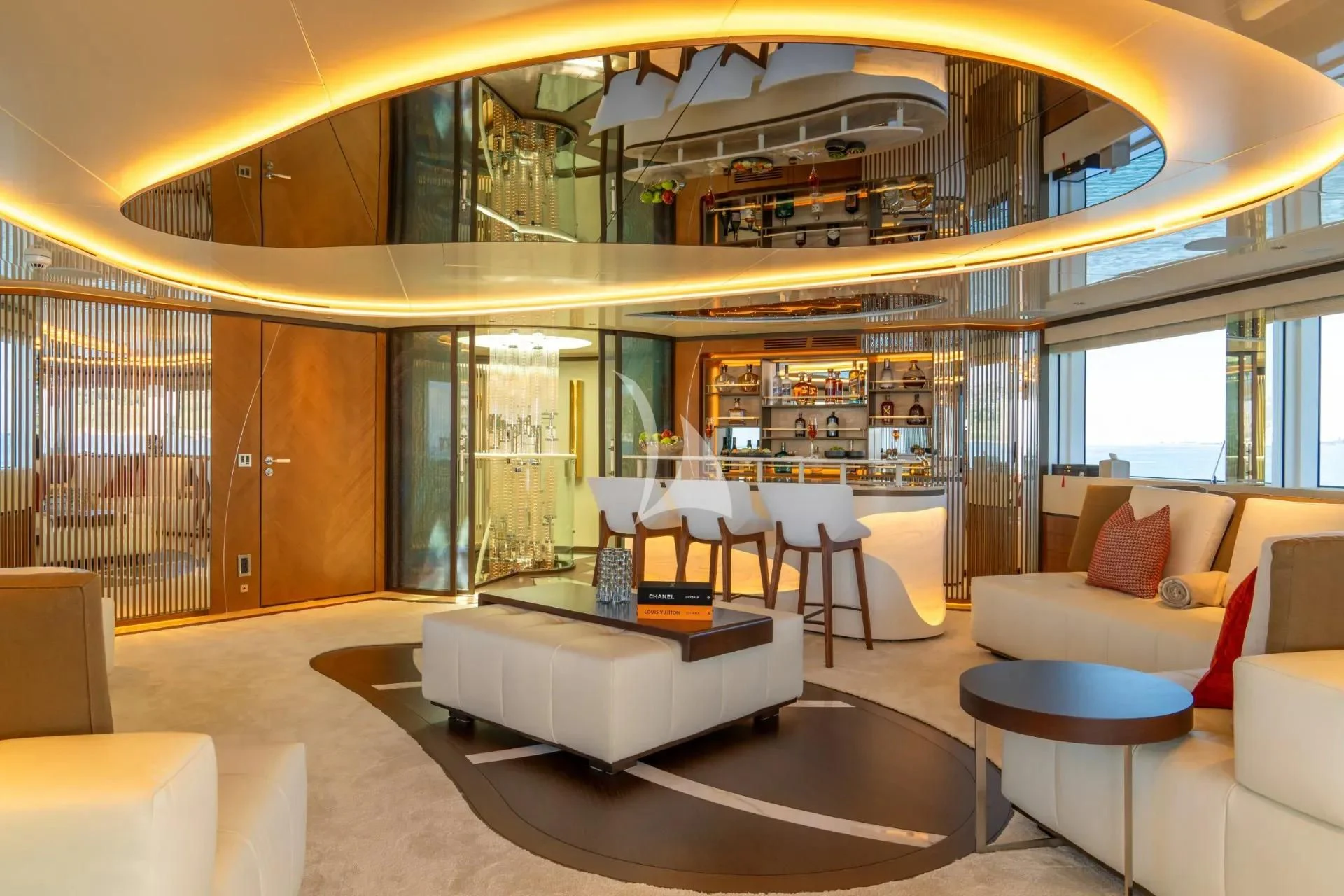 a room with a couch and a table and chairs aboard ETERNAL SPARK Yacht for Sale