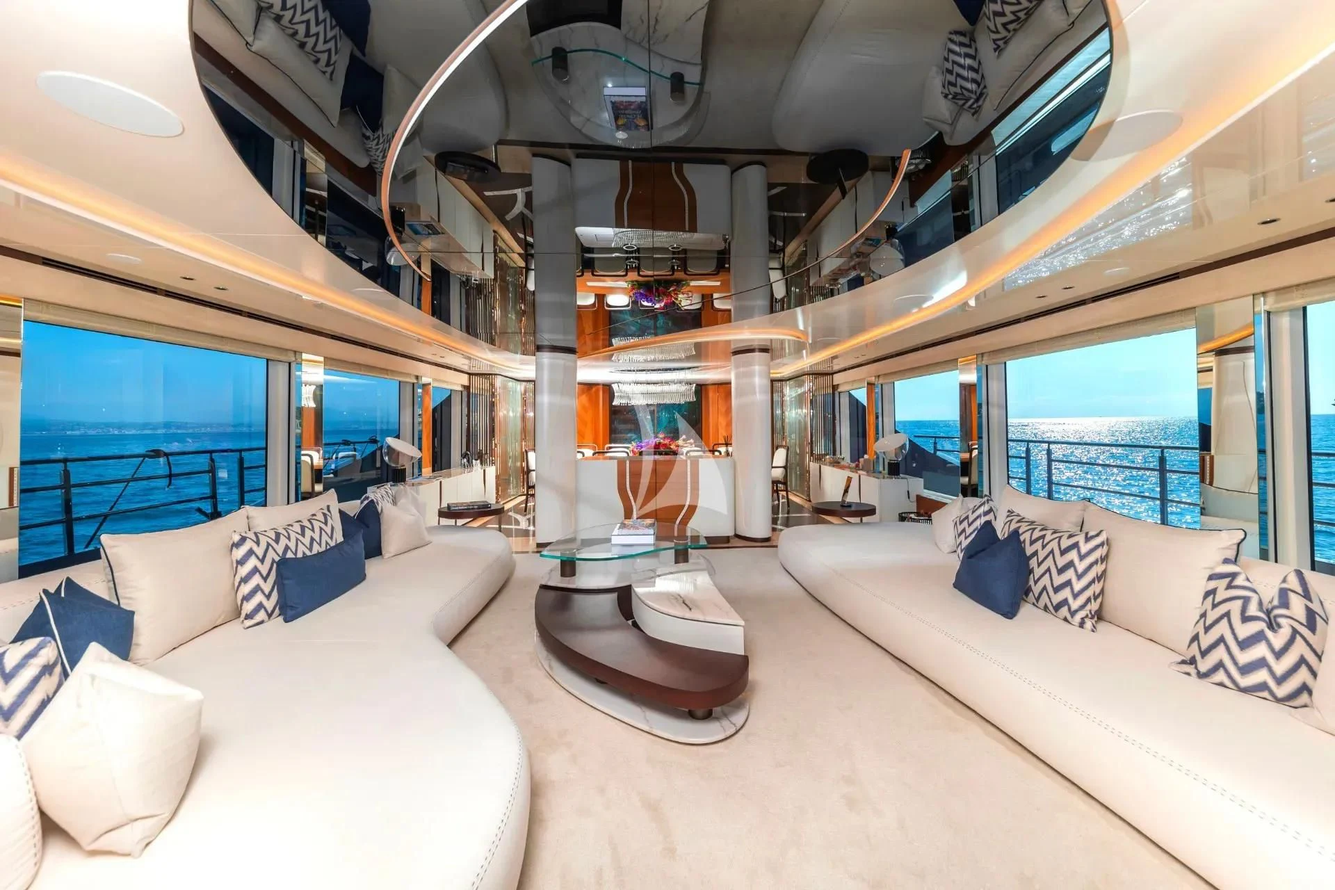a room with a bed and a large window aboard ETERNAL SPARK Yacht for Sale