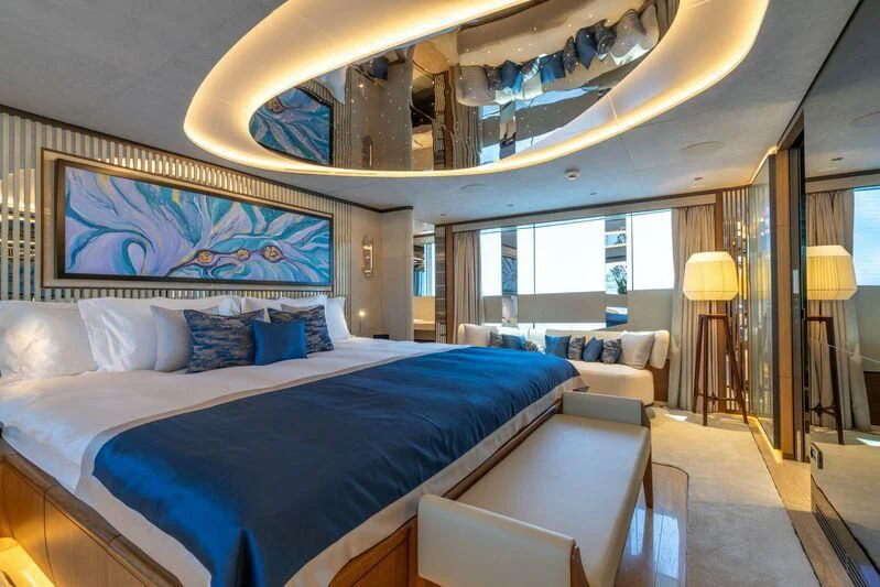a large bedroom with a large bed aboard ETERNAL SPARK Yacht for Sale