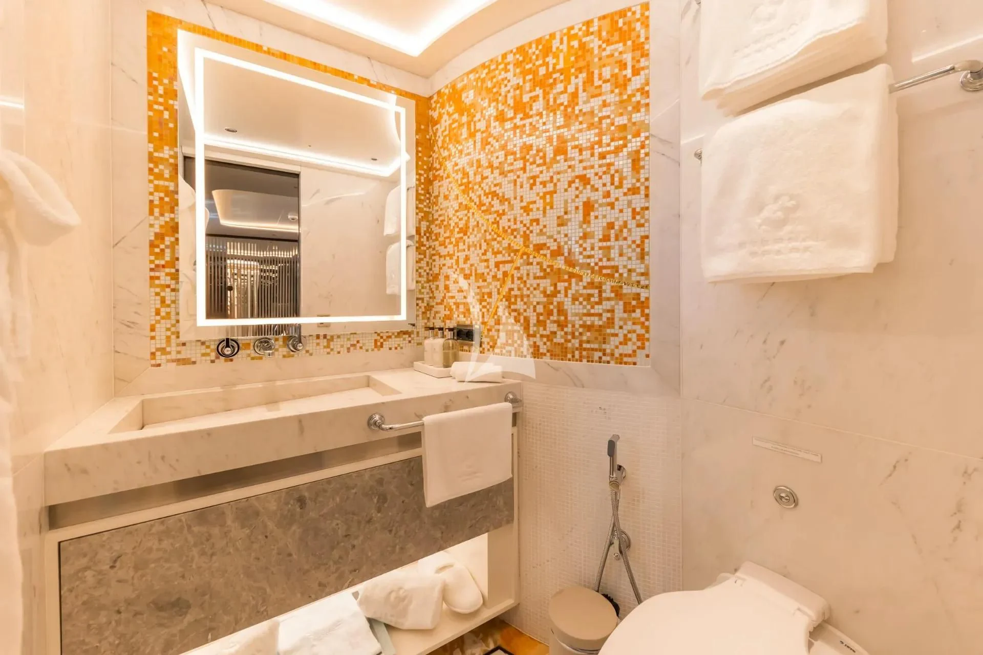 a bathroom with a tub sink and toilet aboard ETERNAL SPARK Yacht for Sale