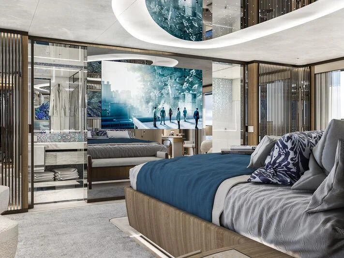 a room with a bed and a large screen aboard ETERNAL SPARK Yacht for Sale