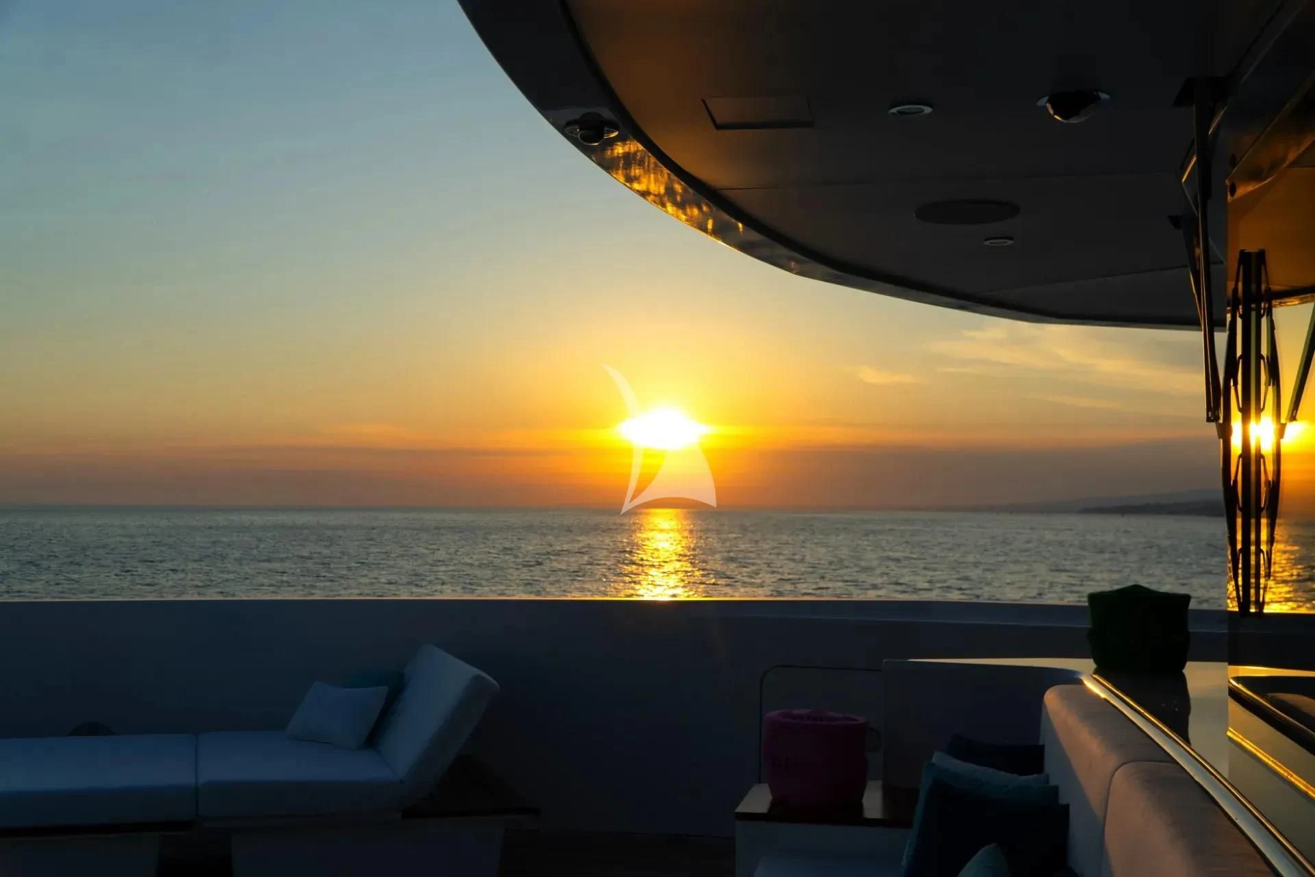 a sunset over a body of water aboard ETERNAL SPARK Yacht for Sale