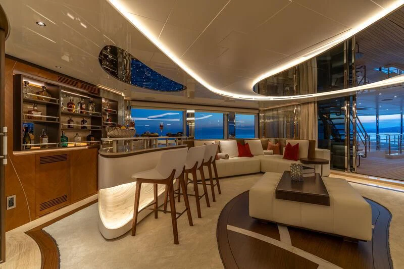 a room with a couch and a table and a tv aboard ETERNAL SPARK Yacht for Sale