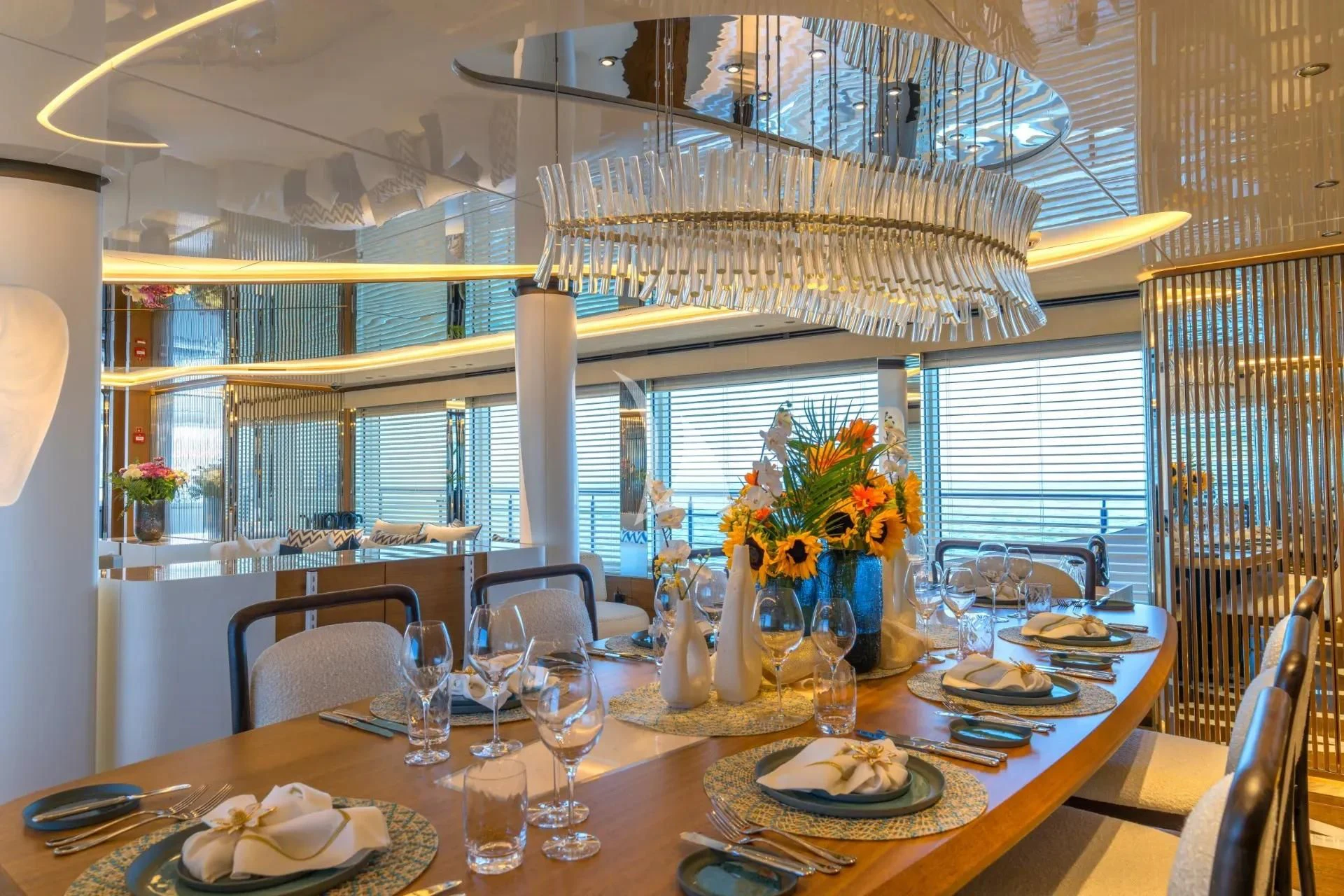 a table with plates and glasses aboard ETERNAL SPARK Yacht for Sale