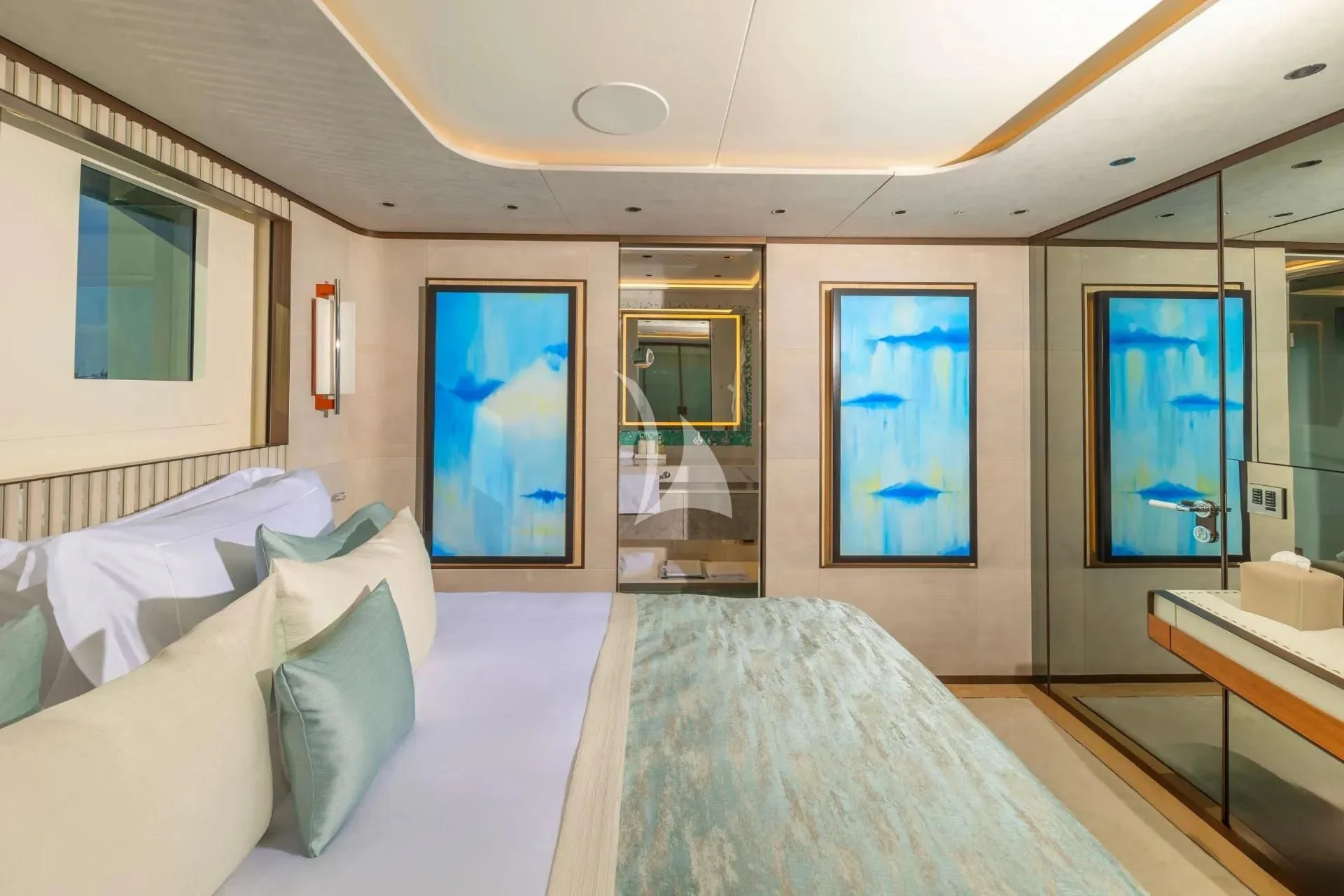 a room with a bed and a desk aboard ETERNAL SPARK Yacht for Sale