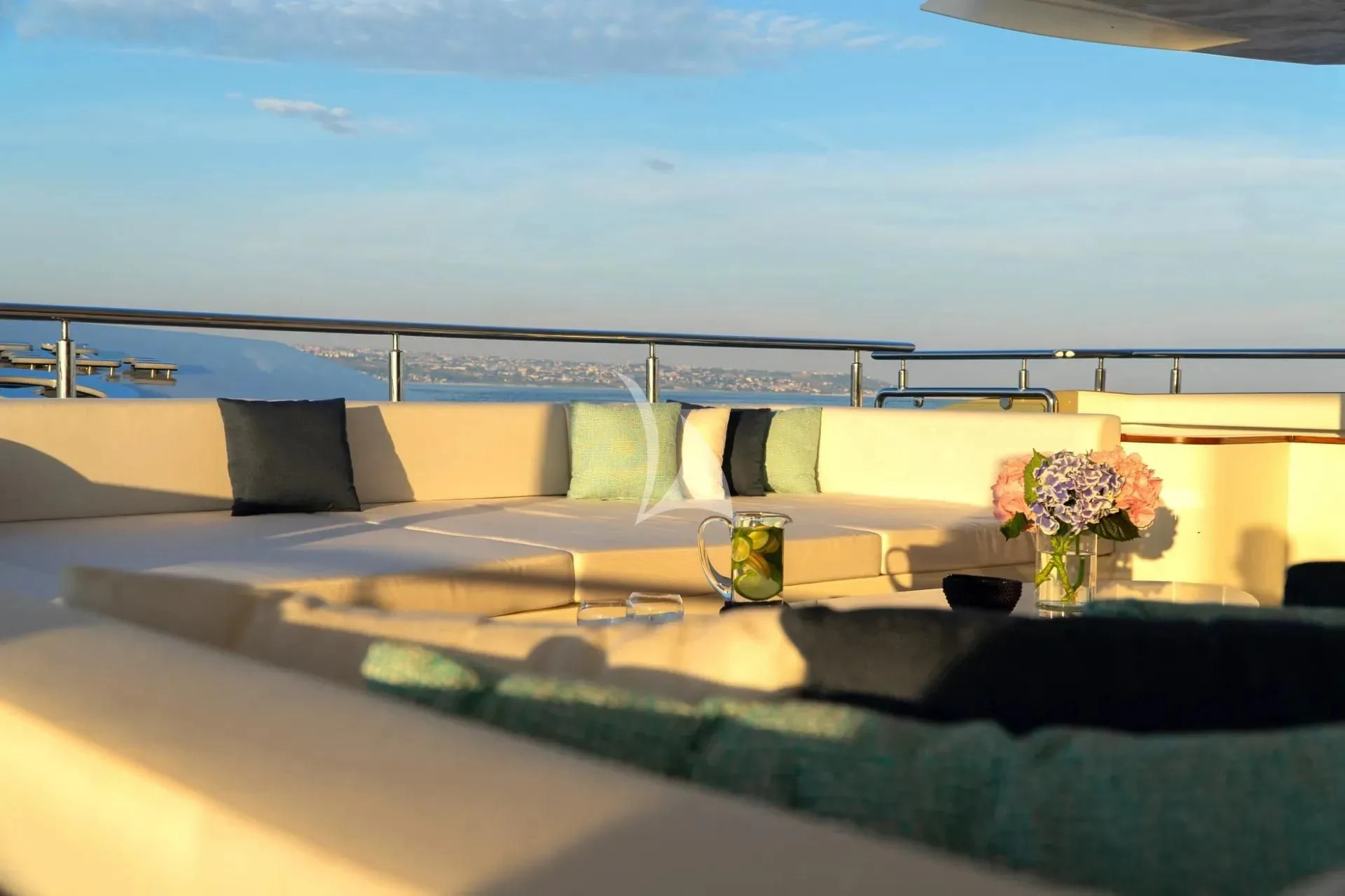 a balcony overlooking a beach aboard ETERNAL SPARK Yacht for Sale