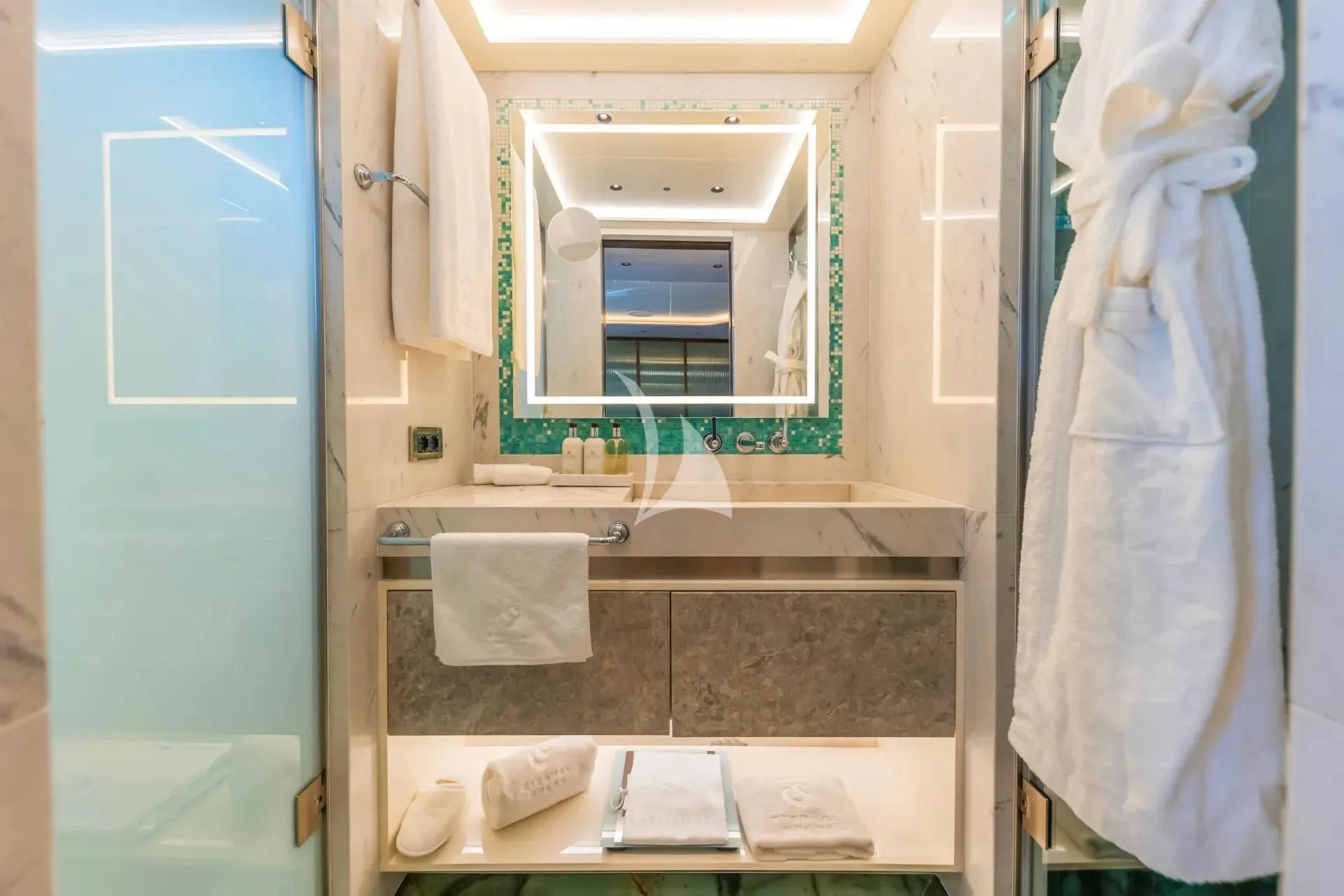 a bathroom with a mirror and countertop sinks aboard ETERNAL SPARK Yacht for Sale