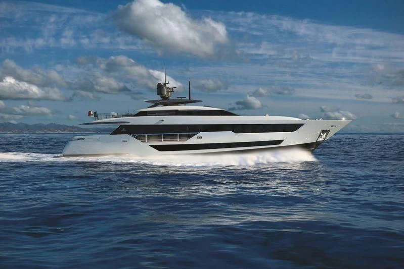 a white yacht in the water aboard CARMA Yacht for Sale