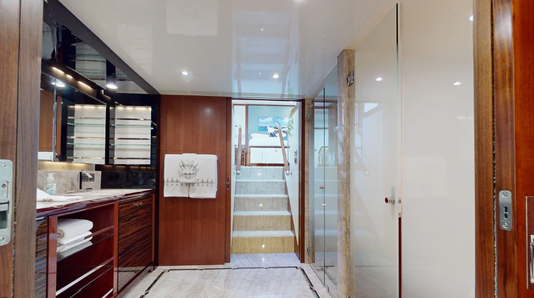 a room with a door and a glass door aboard DRINKABILITY Yacht for Sale
