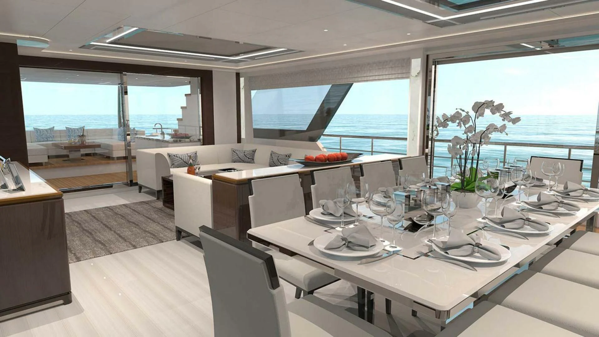 a large room with a table and chairs aboard DRINKABILITY Yacht for Sale