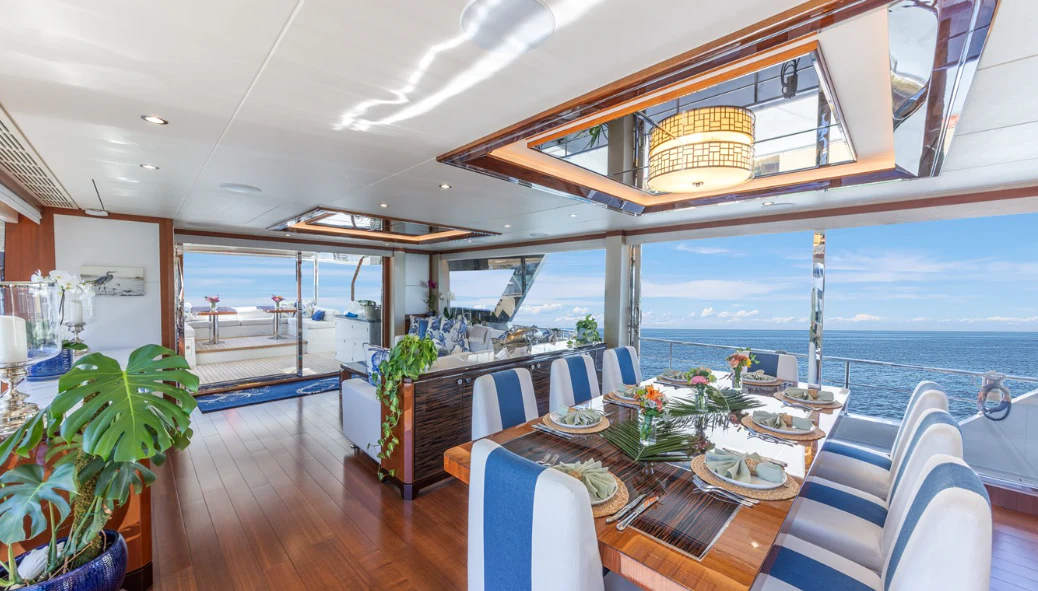 a dining table on a boat aboard DRINKABILITY Yacht for Sale