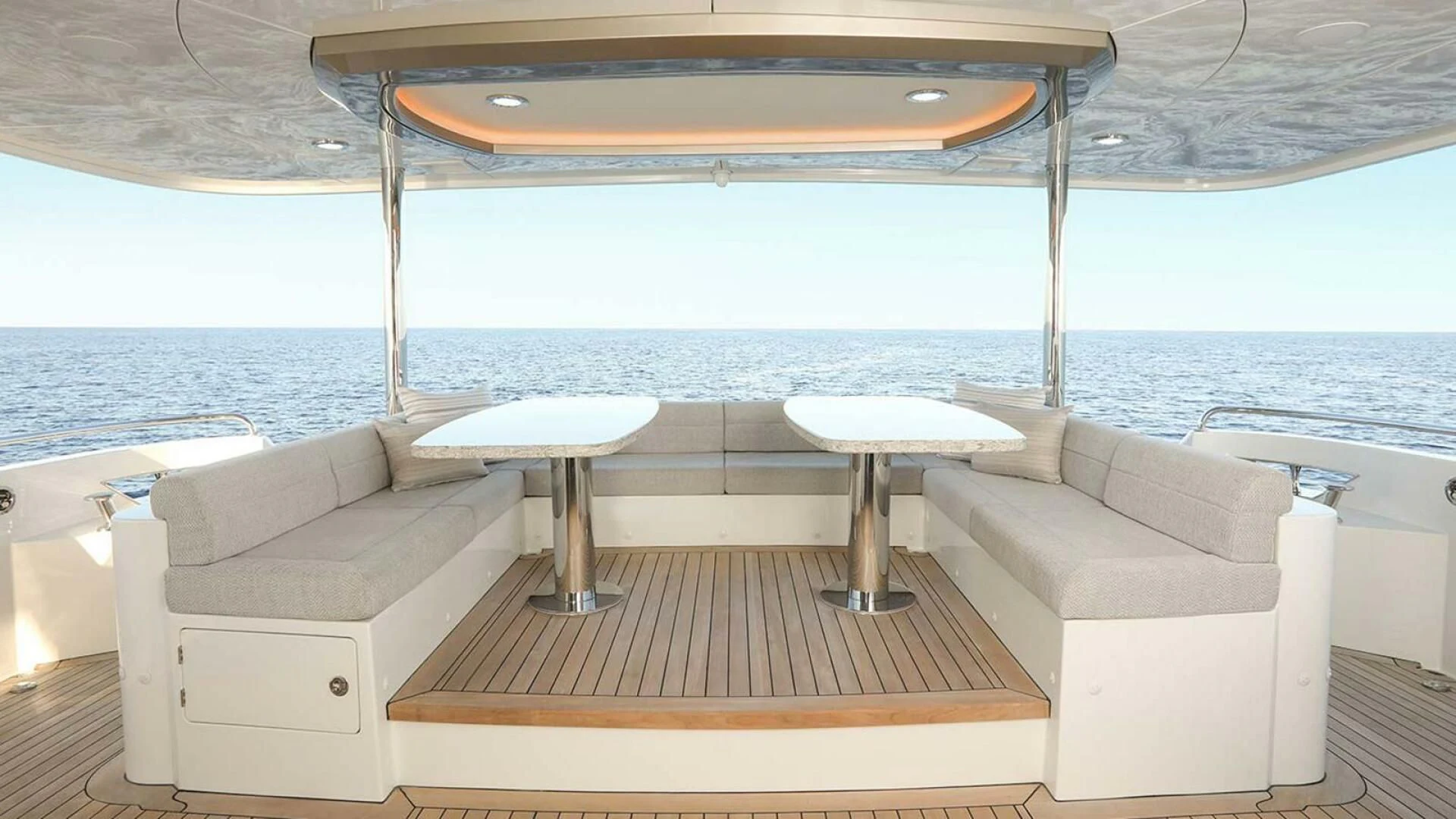 a lounge area on a boat aboard DRINKABILITY Yacht for Sale
