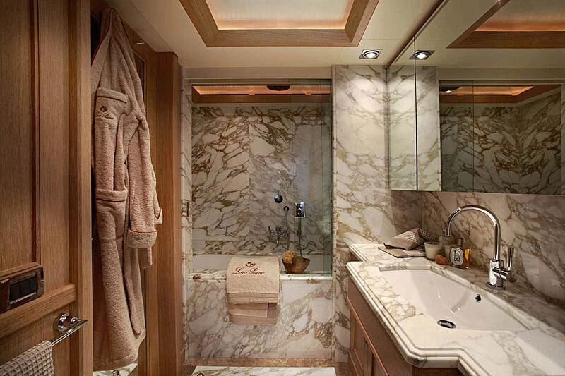 a bathroom with a large mirror aboard LADY I Yacht for Charter