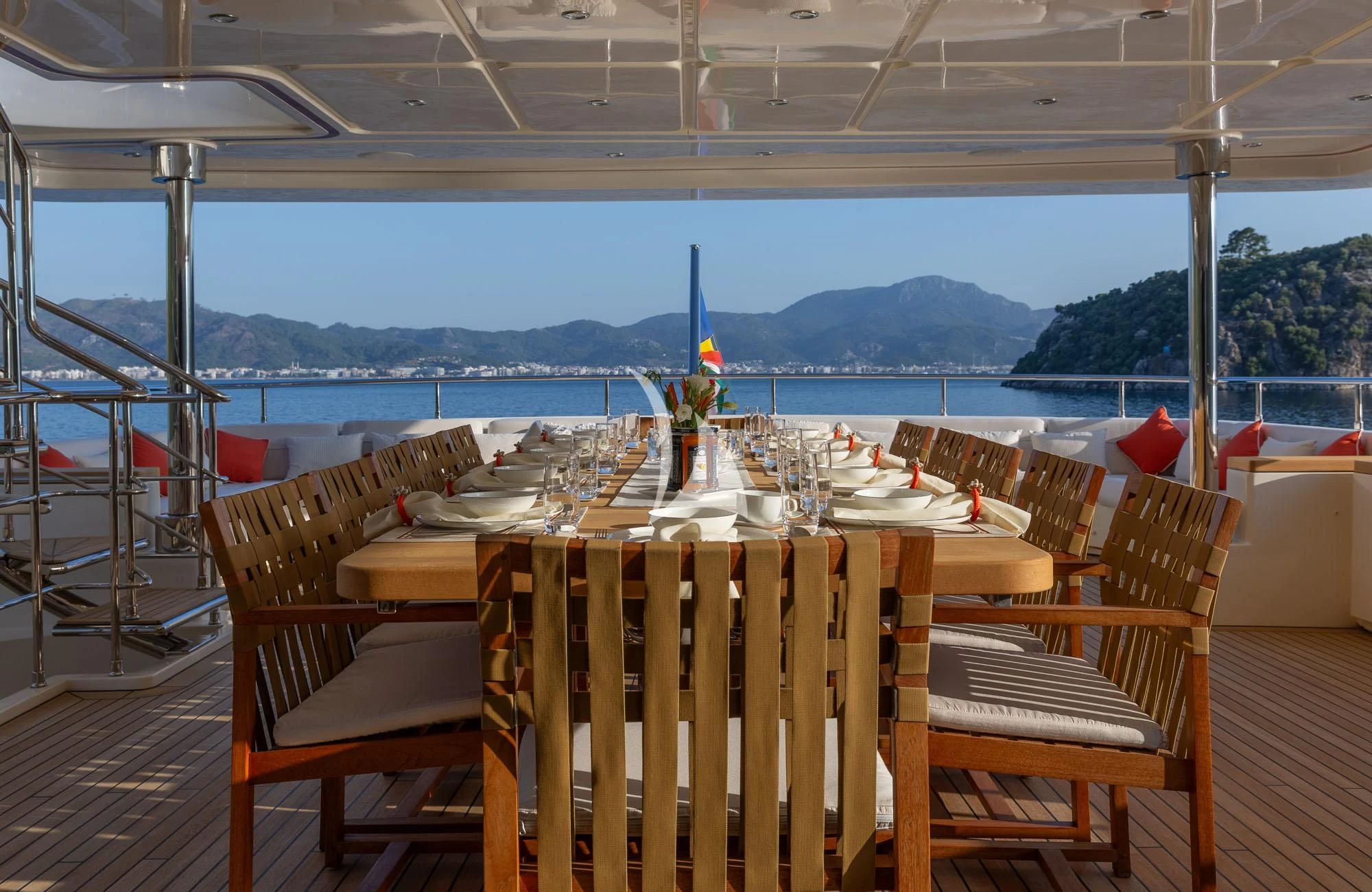 a table set for a dinner party aboard LADY I Yacht for Charter
