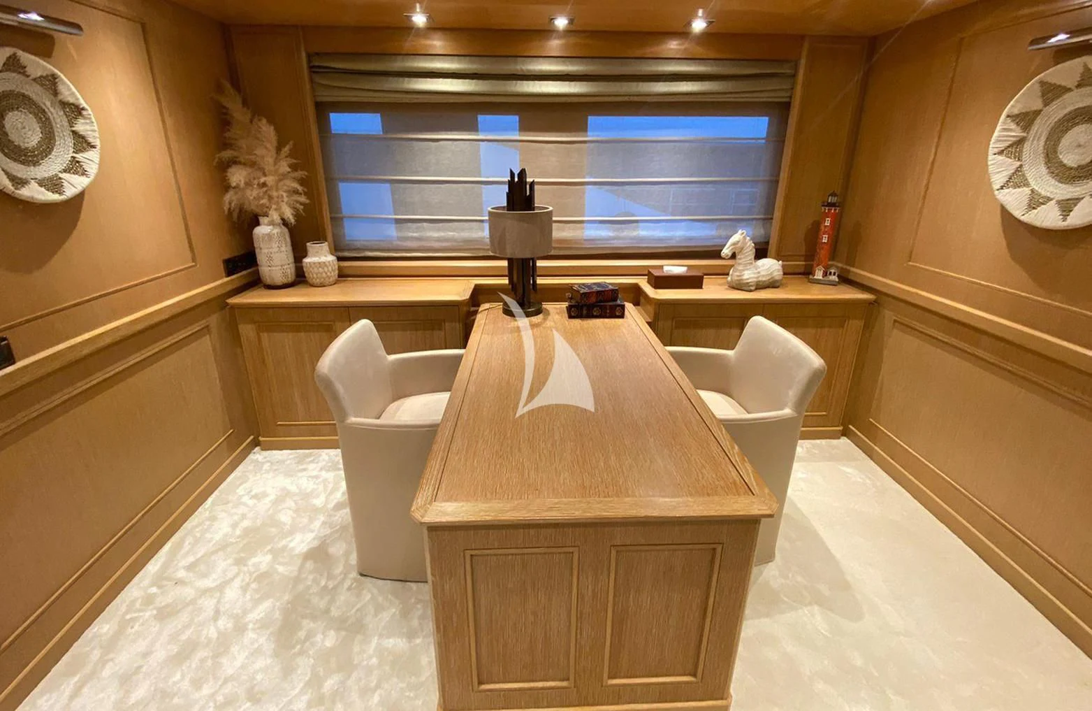 a room with a table and chairs aboard LADY I Yacht for Charter