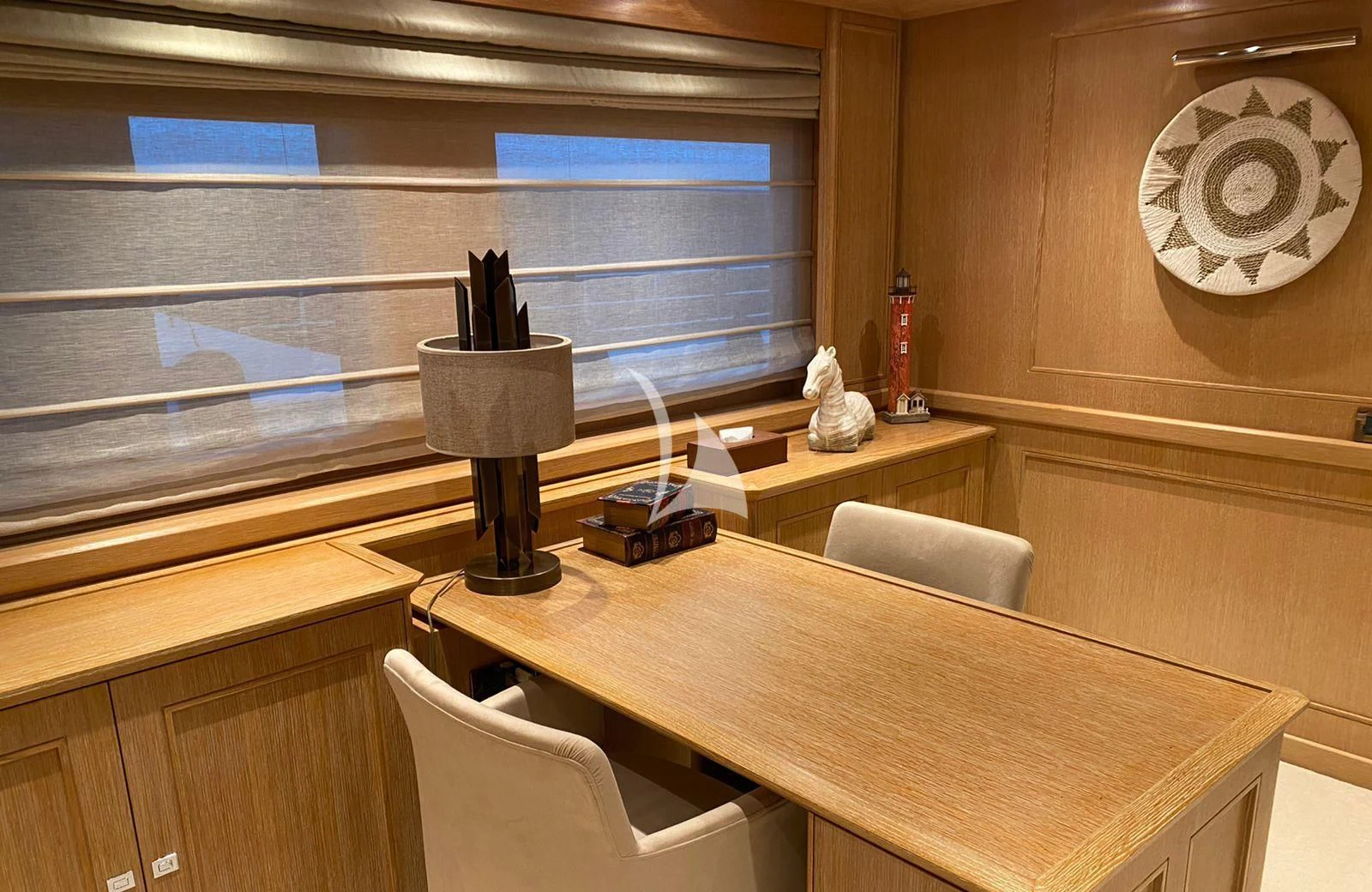 a room with a table and chairs aboard LADY I Yacht for Charter